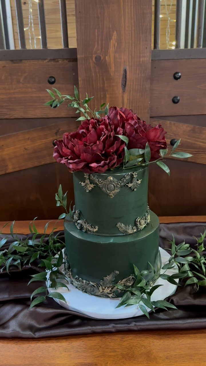 Dark Green Wedding: 13 Ideas for a Forest Reception 8 A two-tier dark green wedding cake with gold filigree and deep red peonies.