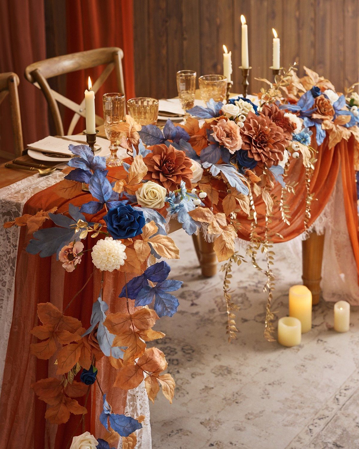 Fall Wedding Color Palette: 10 Ideas Photographed on Real Tables 7 A festive table setting with burnt orange and dusty blue floral arrangements and lit candles.